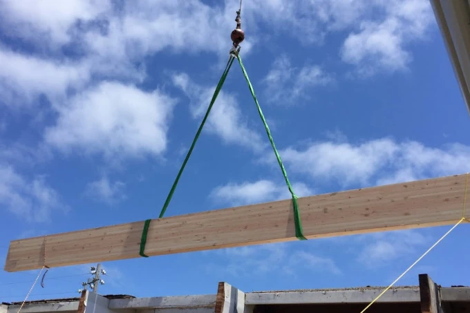 Beam being hoisted